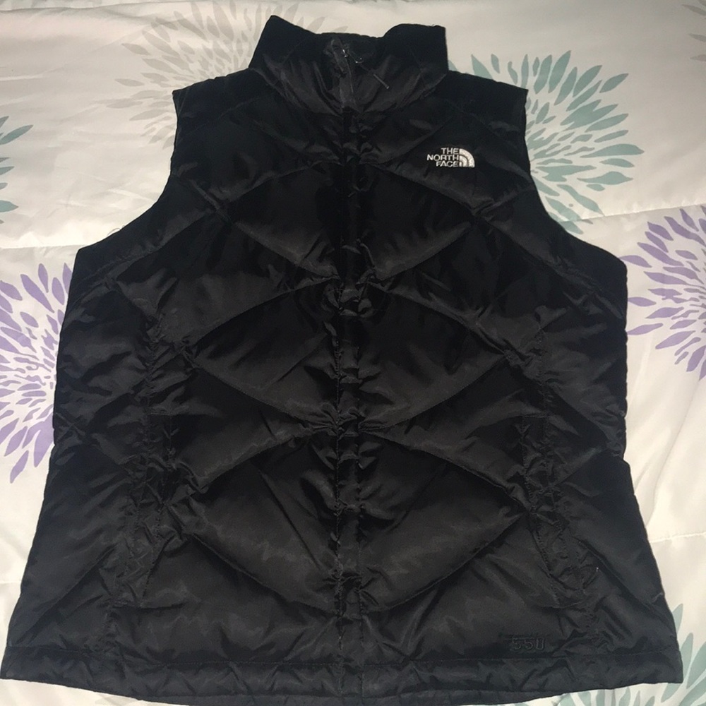 Large North Face puffer vest•